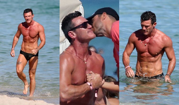 Umięśniony Luke Evans dokazuje na plaży