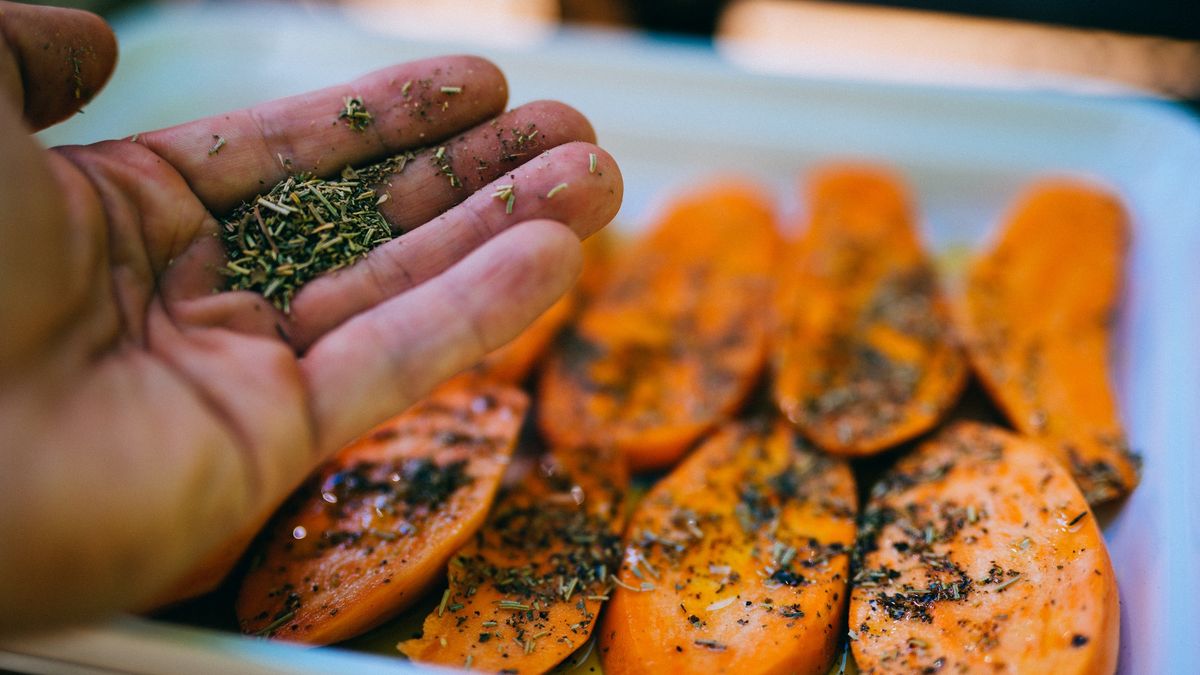 Preparing sweet potato for bbq.Preparing sweet potato for bbq.Guido Mieth