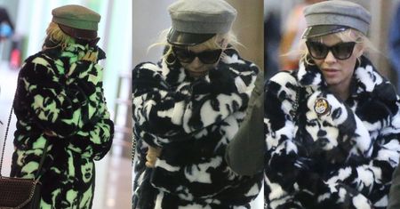 Wstydliwa Pamela Anderson ukrywa twarz na lotnisku w Paryżu (ZDJĘCIA)