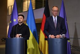 BERLIN, GERMANY - DECEMBER 15: German Chancellor Friedrich Merz (R) and Ukrainian President Volodymyr Zelensky arrive to speak to the media at the Chancellery on December 15, 2025 in Berlin, Germany. Zelensky is meeting with European leaders tonight following his meetings with negotiators from the U.S. yesterday and earlier today at the Chancellery in an effort to work towards a ceasefire in Russia's ongoing war in Ukraine.  (Photo by Sean Gallup/Getty Images)