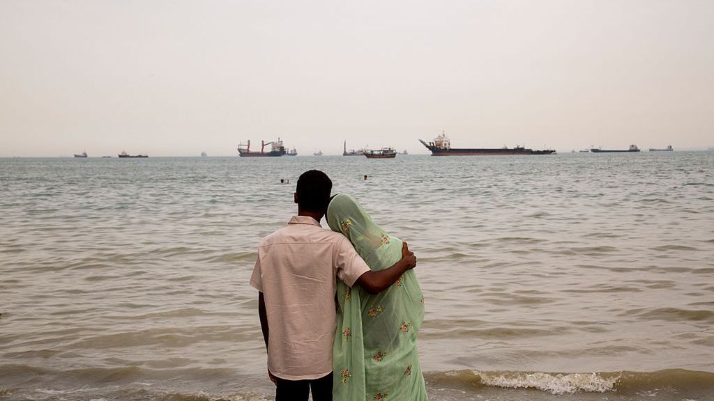 Iran Seeks To Assert Control Over Strait Of Hormuz Despite Cease-Fire Extension
BANDAR ABBAS, IRAN - APRIL 22: A man and woman look out to sea as ships are anchored near the shoreline on April 22, 2026 in Bandar Abbas, Iran. Bandar Abbas is a port city and the capital of Hormozgan Province, along the Persian Gulf and Strait of Hormuz. Earlier today, Iran's Islamic Revolutionary Guards Corps said it had attacked and seized two ships near the Strait of Hormuz as it tried to assert control over the critical waterway. The incidents came the day after U.S. President Donald Trump announced an extension of a ceasefire between his country and Iran, and after Iran refused to attend the latest proposed round of peace talks in Islamabad. (Photo by Stringer/Getty Images)
Getty Images
bestof, topix