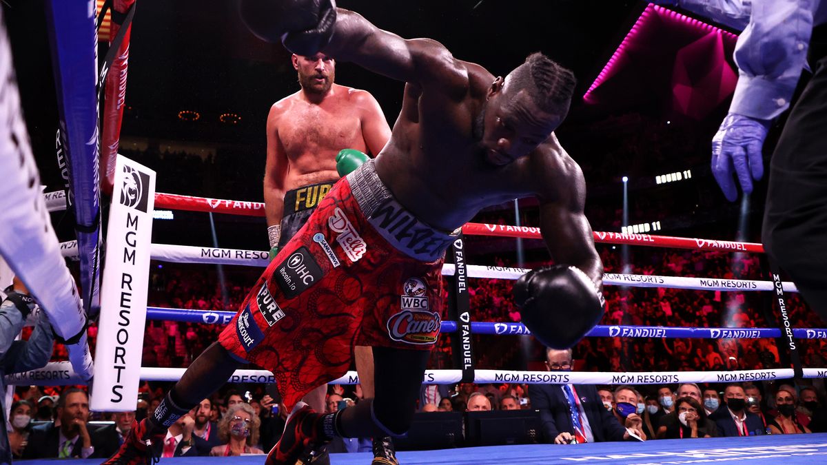 Tyson Fury v Deontay WilderLAS VEGAS, NEVADA - OCTOBER 09: Deontay Wilder (R) is knocked out by Tyson Fury in the 11th round during their WBC heavyweight title fight at T-Mobile Arena on October 09, 2021 in Las Vegas, Nevada. (Photo by Al Bello/Getty Images)Al Belloboxing