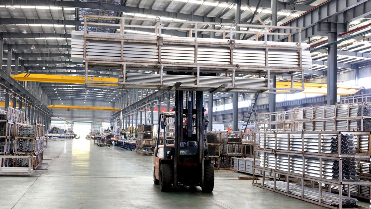 QUANZHOU, CHINA - MAY 14: An employee drives a forklift to transfer aluminum alloy products at the workshop of Meitu (Fujian) Aluminium Co., Ltd. on May 14, 2024 in Quanzhou, Fujian Province of China. (Photo by Wang Wangwang/VCG via Getty Images)
