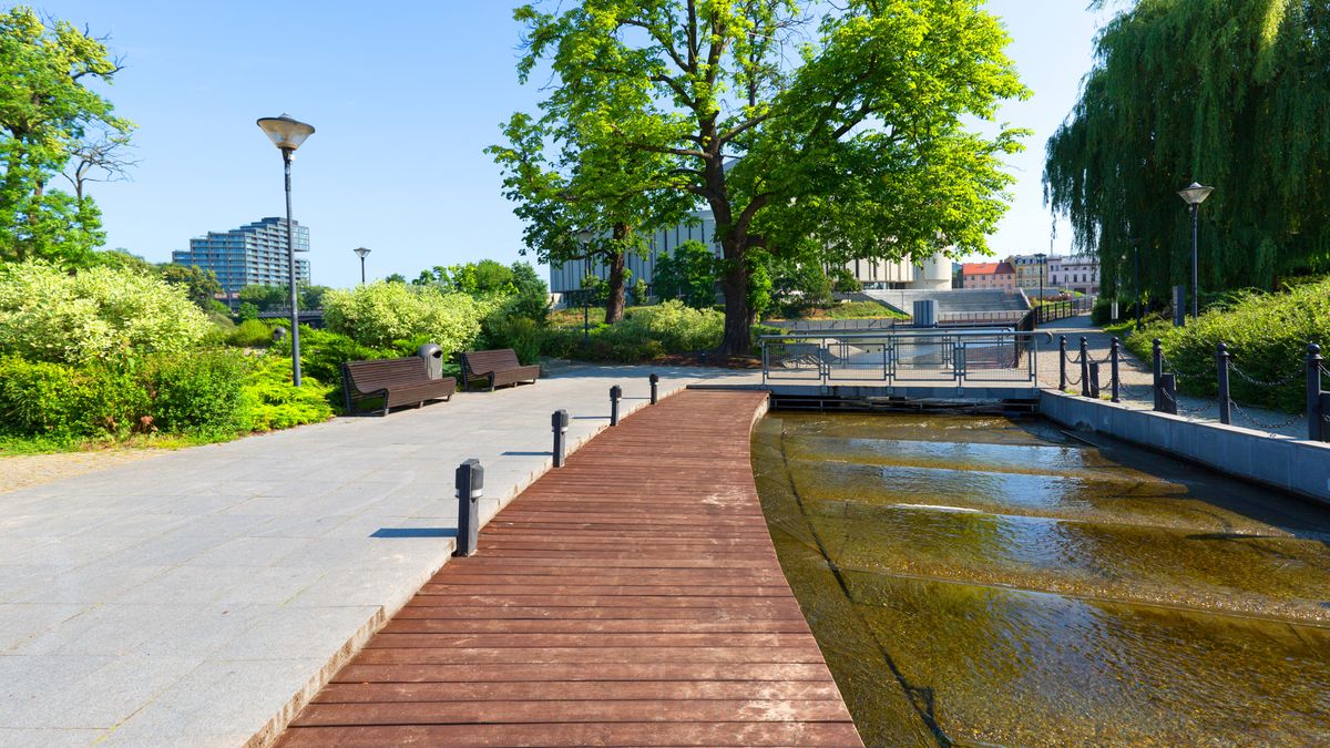 Mill Island surrounded by Brda River and its Mlynowka branch, Bydgoszcz, PolandBydgoszcz, Poland - June 26, 2020: Mill Island surrounded by Brda River and its Mlynowka branch, place with cultural and recreational facilitiesjolanta wojcickabydgoszcz, poland, Mill Island, water, island, architecture, park, grass, green, tree, plant, nature, landscape, landmark, city, old, river, canal, monument, old, building, famous, attraction, tourism, history, river Brda, medieval, view, historic, urban, brick, cityscape, historical, town, old town, exterior, destination, sightseeing, ancient, outdoor, europe, travel, Kuyavian-Pomeranian Voivodeship, bridge, nature, wood, park, water, city, path, tree, river, landscape, trees, wooden, garden, travel, architecture, summer, sky, way, walkway, road, walk, lake, outdoors, footpath, buildings