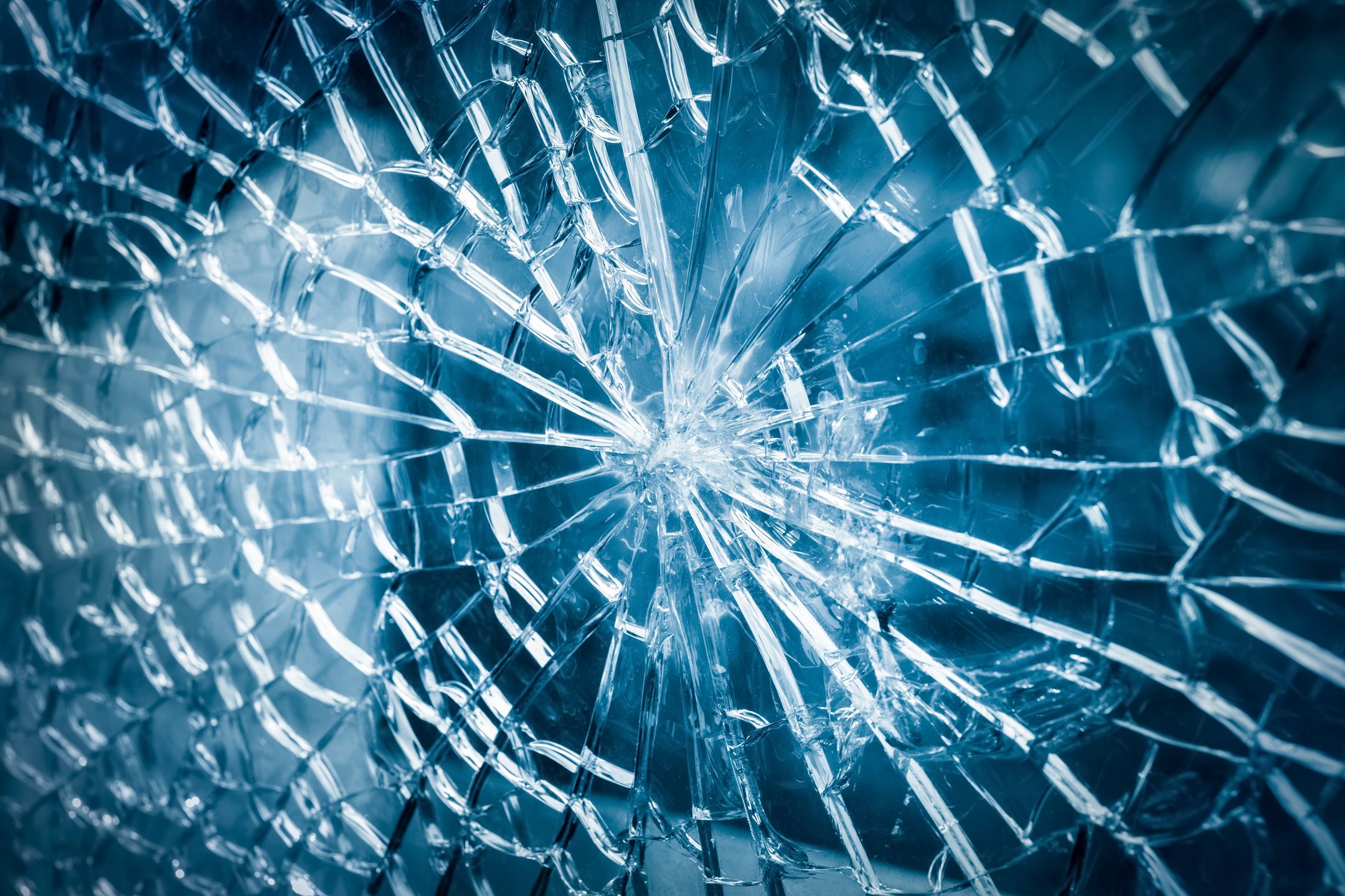 broken tempered glass closeup , background of glass was smashed 