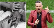 Nikt o tym nie wiedział. Robbie Williams ma trzecie dziecko! Do sieci trafiło zdjęcie maleństwa