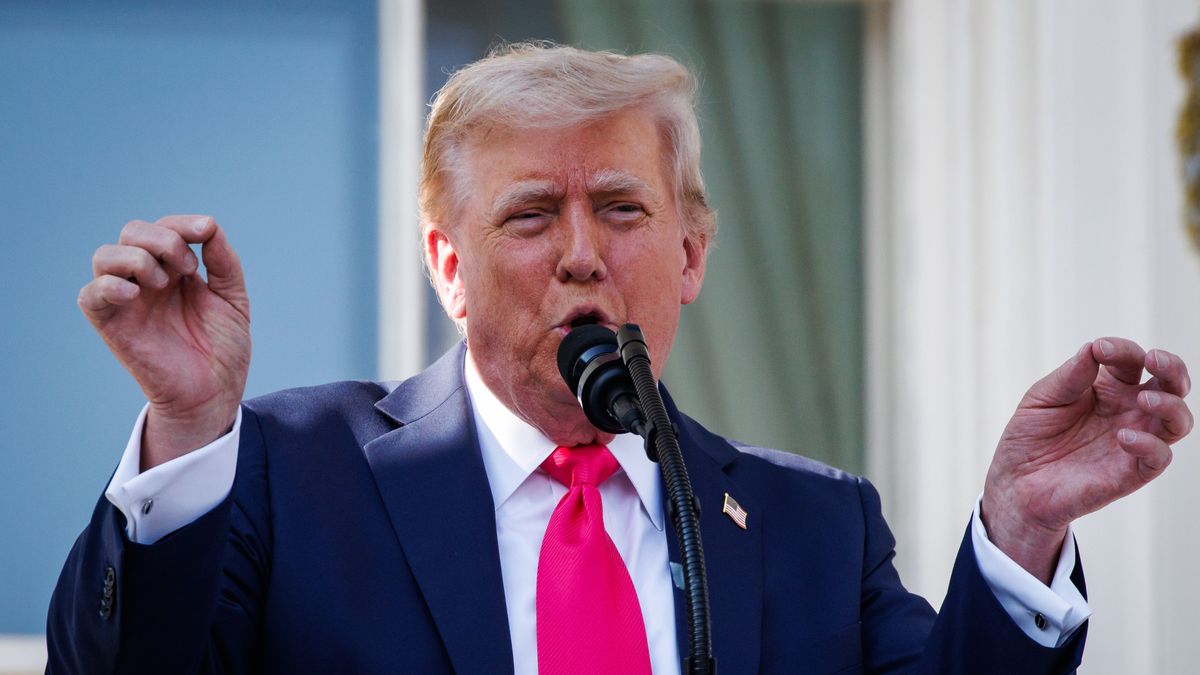 WASHINGTON, DC - JULY 04: U.S. President Donald Trump, joined by first lady Melania Trump, delivers remarks during an Independence Day military family picnic on the South Lawn of the White House on July 04, 2025 in Washington, DC. At the picnic President Trump signed the One, Big Beautiful Bill Act into law after Congress passed the bill yesterday following weeks of negotiations with Republican holdouts. The bill makes permanent President Donald Trump's 2017 tax cuts, increase spending on defense and immigration enforcement and temporarily cut taxes on tips, while cutting funding for Medicaid, food assistance and other social safety net programs. (Photo by Samuel Corum/Getty Images)