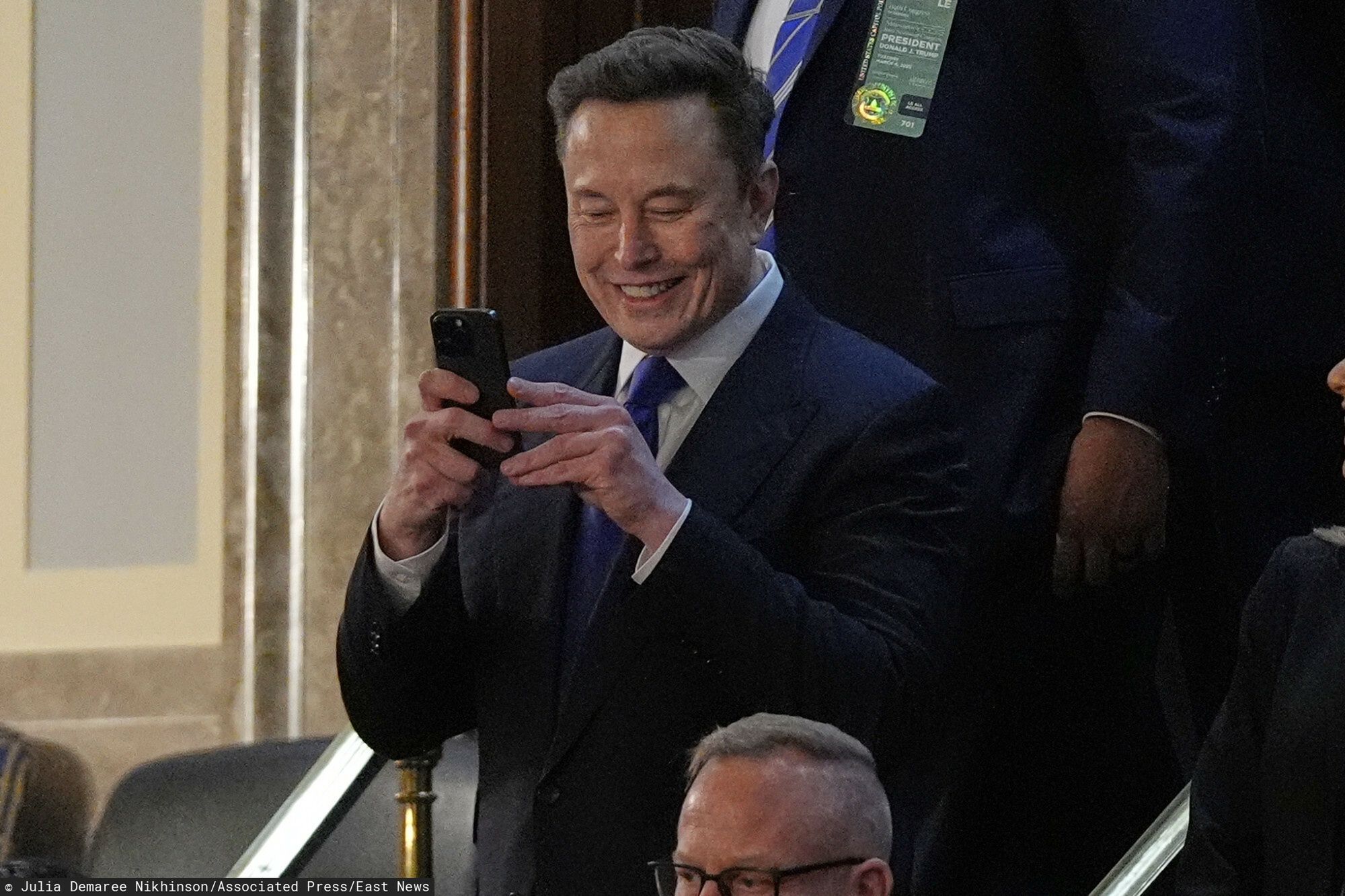 Temporary
Elon Musk takes a photo as he arrives before President Donald Trump addresses a joint session of Congress in the House chamber at the U.S. Capitol in Washington, Tuesday, March 4, 2025. (AP Photo/Julia Demaree Nikhinson)
Julia Demaree Nikhinson