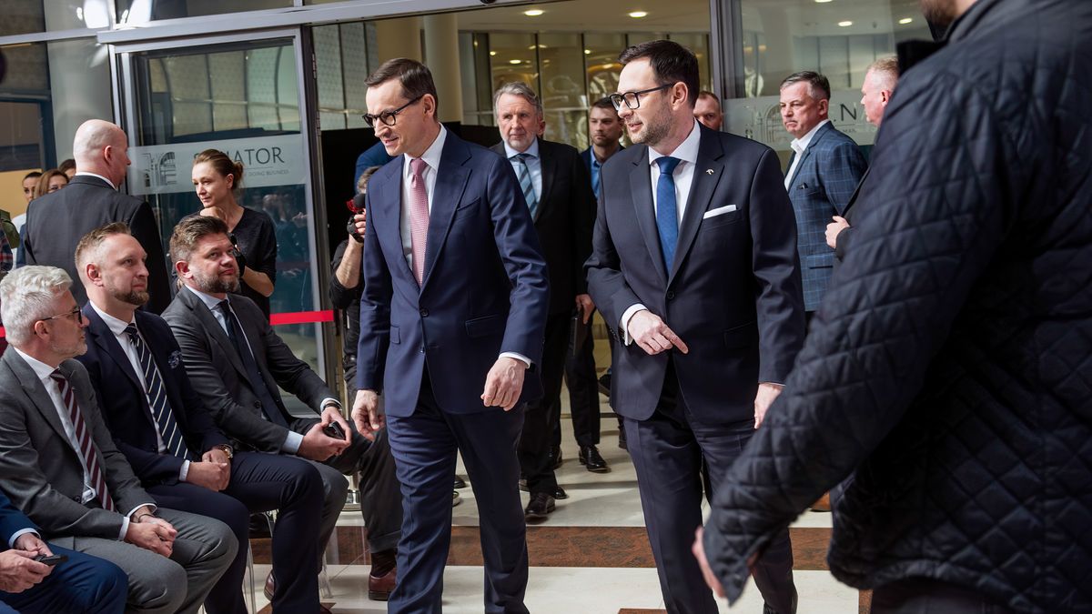 WARSAW, POLAND - 2023/04/17: Daniel Obajtek (R), the President and CEO of the Polish Oil Company ORLEN and Prime Minister Mateusz Morawiecki (L) seen at the press conference in Warsaw. Daniel Obajtek, the President and CEO of the Polish Oil Company ORLEN, announced the details of the planned investments in Small Modular Reactors (SMR) for Poland. For this purpose, the company Orlen Synthos Green Energy (OSGE) was established, supported by the Polish billionaire - Michal Solowow. OSGE will buy reactors from US-based GE Hitachi. (Photo by Attila Husejnow/SOPA Images/LightRocket via Getty Images)