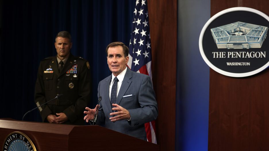 ARLINGTON, VIRGINIA - AUGUST 17:  U.S. Department of Defense Press Secretary John Kirby (R) speaks as Army Major General William Taylor (L) listens during a news briefing at the Pentagon August 17, 2021 in Arlington, Virginia. Kirby held a news briefing to discuss the current situation in Afghanistan after the Taliban took control of the capital city of Kabul. (Photo by Alex Wong/Getty Images)
