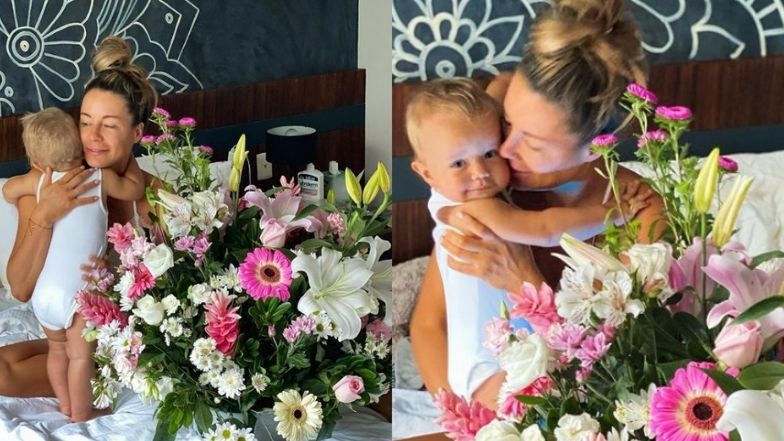 Henio wręcza mamie urodzinowy bukiet