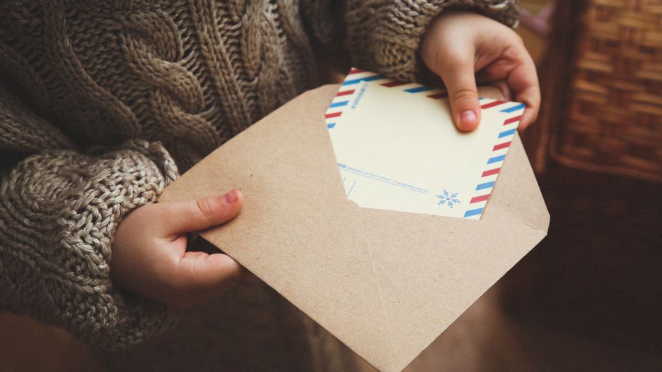 child writes a letter to Santa Claus in the festive gift envelopechild, gift, letter, envelope, holiday, christmas, new year, santa, nicholas, miracle, hope, fairy tale, holiday, news, mail, hands, people, children, happiness, winter, home, inside, family, lapland, answer, wish