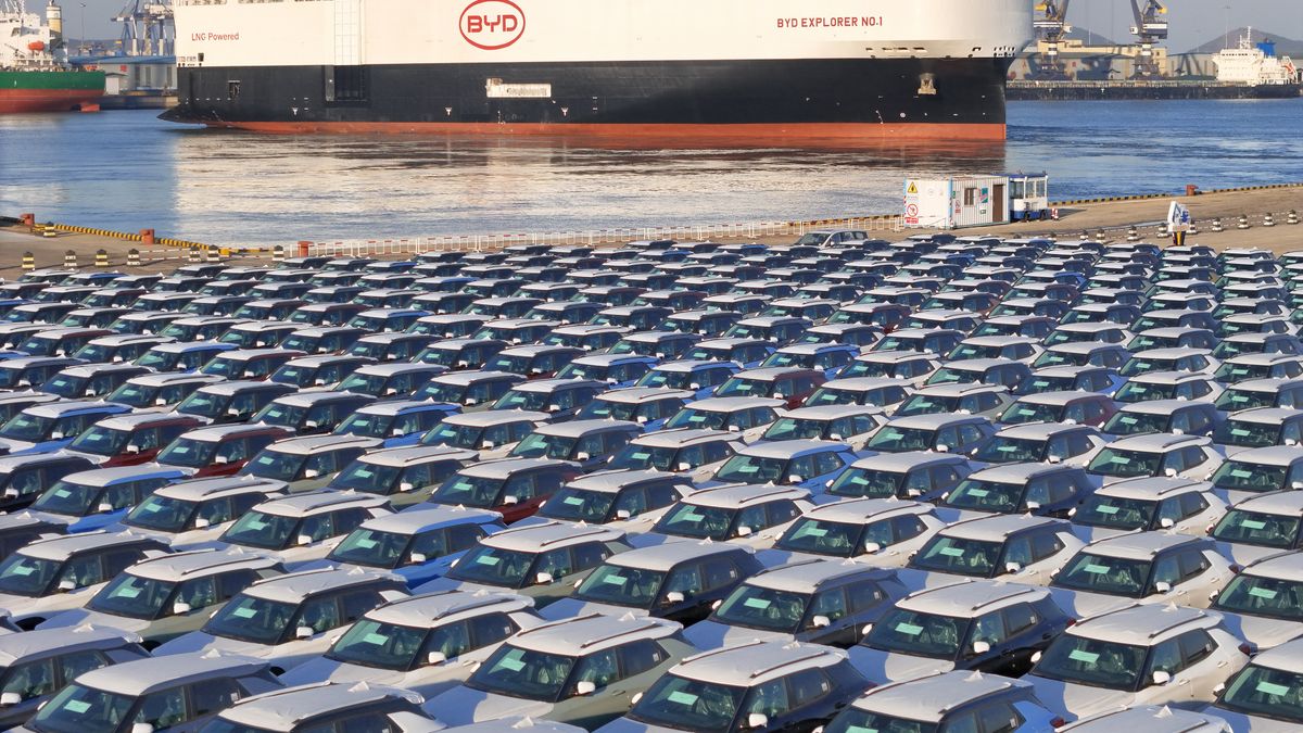 YANTAI, CHINA - JANUARY 10 2024: New BYD cars wait to be loaded onto a newly completed ro-ro ship named BYD Explorer No.1 for her maiden voyage in Yantai in east China's Shandong province. China's BYD has overtaken Tesla as the world's largest maker of pure-electric vehicles. (Photo credit should read TANG KE / Feature China/Future Publishing via Getty Images)