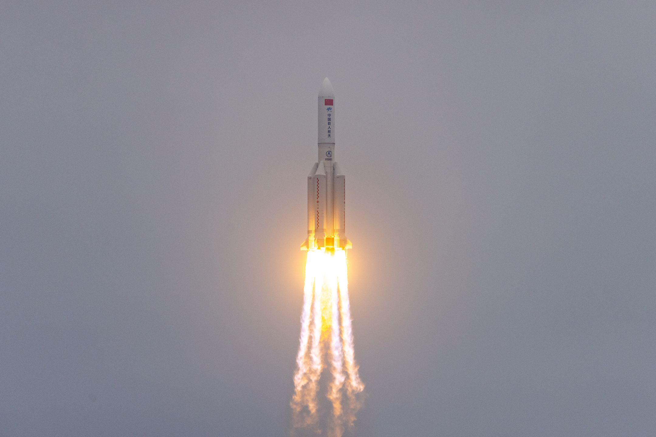 WENCHANG, CHINA - APRIL 29: The Long March-5B Y2 rocket carrying the core module of China's space station, Tianhe, blasts off from the Wenchang Spacecraft Launch Site on April 29, 2021 in Wenchang, Hainan Province of China. (Photo by Hua Jiajun/VCG via Getty Images)