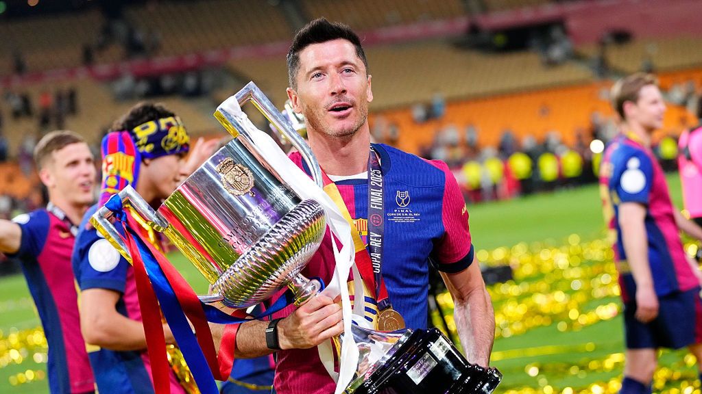 Barcelona v Real Madrid - Copa del Rey Final
Robert Lewandowski centre-forward of Barcelona and Poland celebrates with the trophy after winning the Copa del Rey Final match between FC Barcelona and Real Madrid at Estadio de La Cartuja on April 26, 2025 in Seville, Spain. (Photo by Jose Breton/Pics Action/NurPhoto via Getty Images)
NurPhoto
final, spanish football, match, spanish cup, player, real madrid, tournament, trophy, la cartuja stadium, april 26, pics action, football, jose breton, victory, centre-forward, final match, barcelona v real madrid, fc barcelona, nurphoto, win, team, trophy presentation., estadio de la cartuja, copa del rey, barcelona, professional footballer