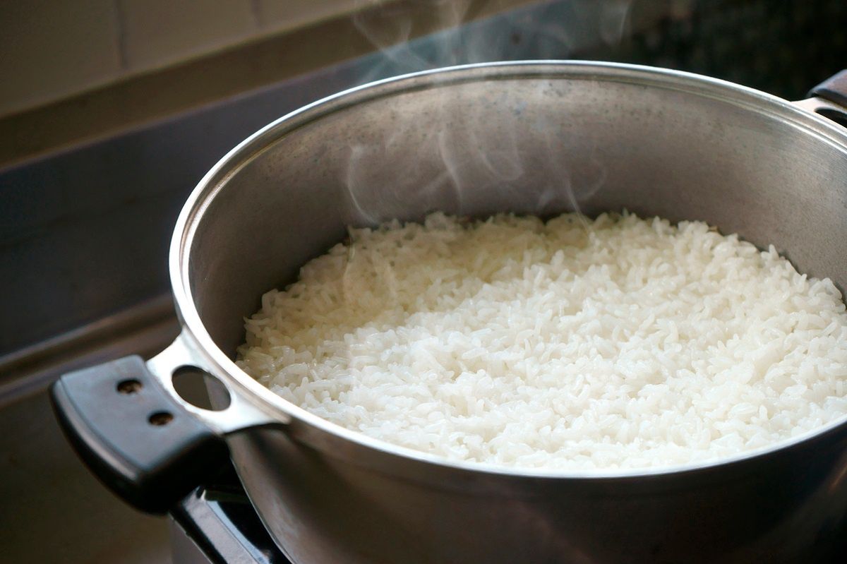 This is how I cook rice and it never sticks. I have tried and tested methods for this.