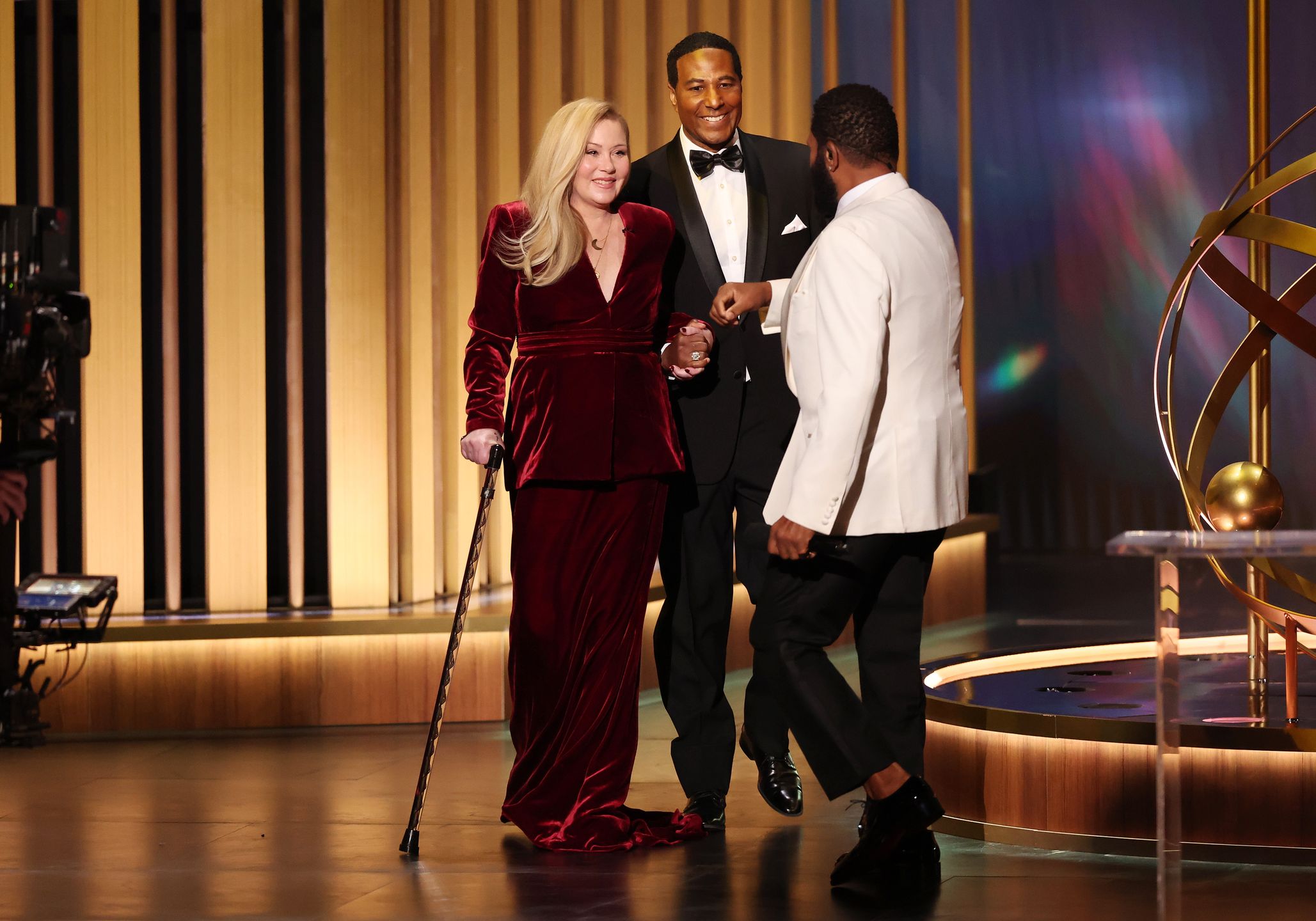 Christina Applegate, a guest and host Anthony Anderson speak onstage at the 75th Primetime Emmy Awards held at the Peacock Theater on January 15, 2024 in Los Angeles, California. (Photo by Christopher Polk/Variety via Getty Images)