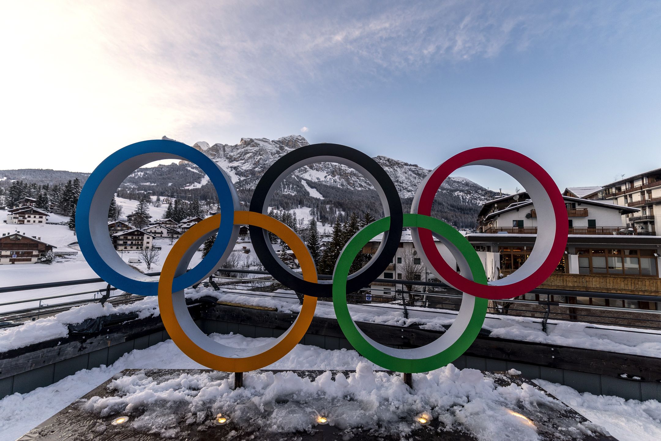 CORTINA D'AMPEZZO, ITALY - JANUARY 26: The Olympic Rings are set in front of surrounding mountains on January 26, 2026 in Cortina d'Ampezzo, Italy. Cortina will host Sliding, Curling and Women's Alpine events. (Photo by Maja Hitij/Getty Images)