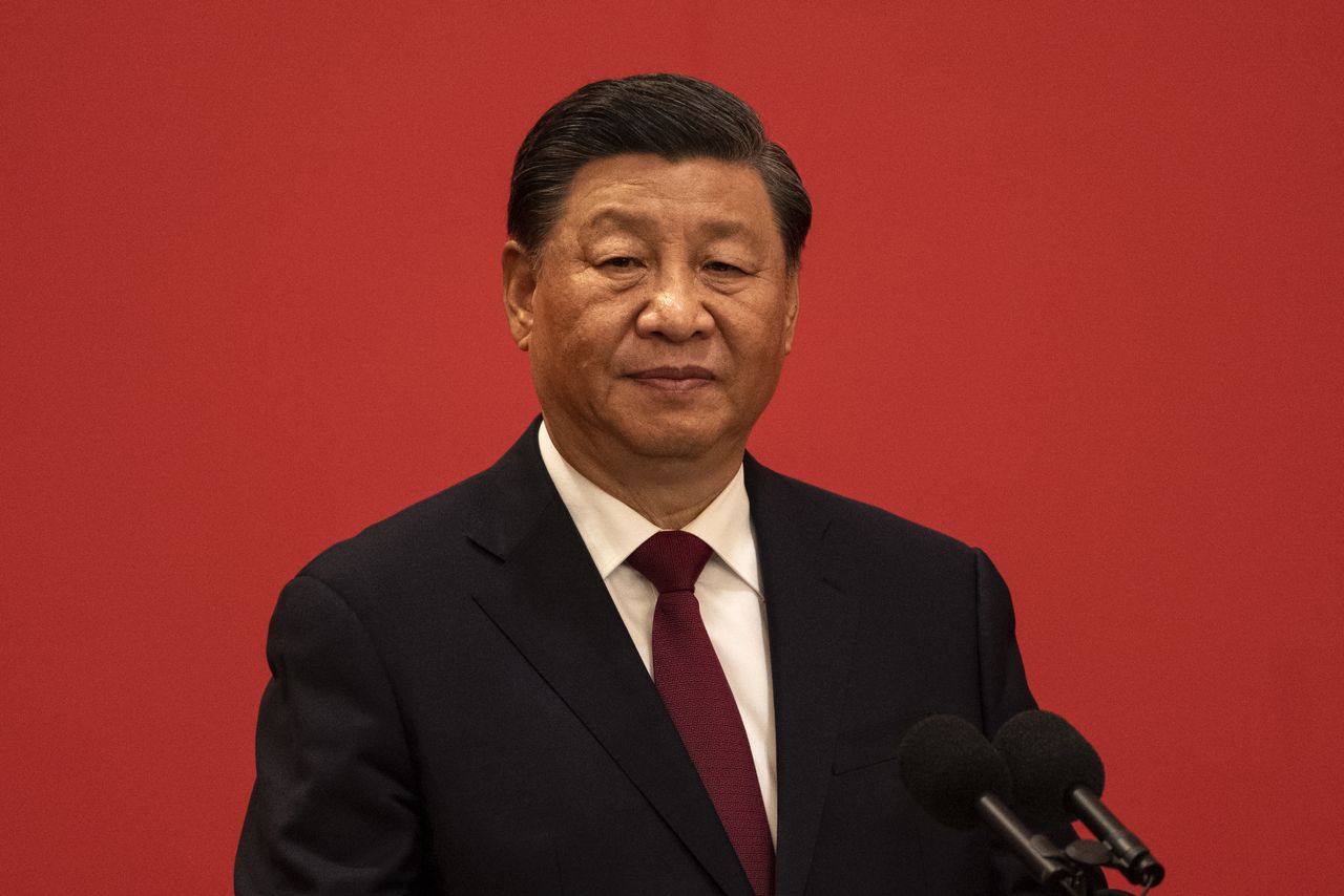 BEIJING, CHINA - OCTOBER 23: General Secretary and Chinese President  Xi Jinping listens to a translation at a press event with Members of the new Standing Committee of the Political Bureau of the Communist Party of China and  Chinese and Foreign journalists at The Great Hall of People on October 23, 2022 in Beijing, China. (Photo by Kevin Frayer/Getty Images)