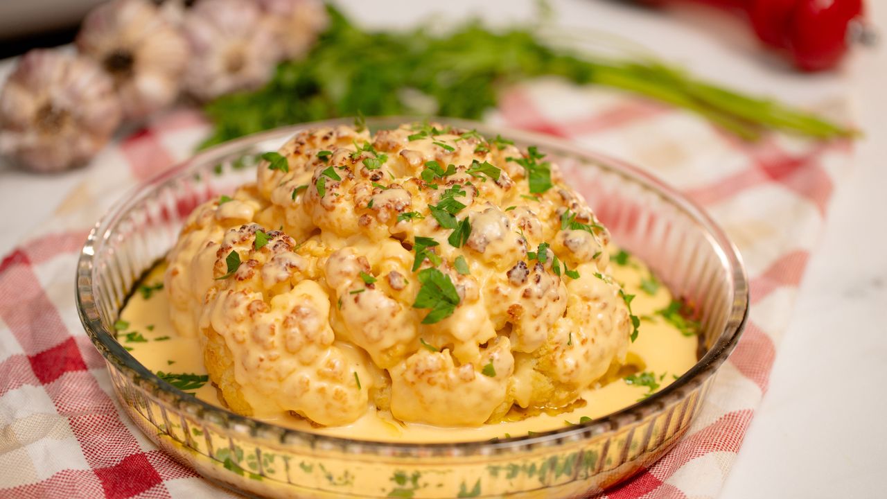 Roasted cauliflower crowned with irresistible cheese delight