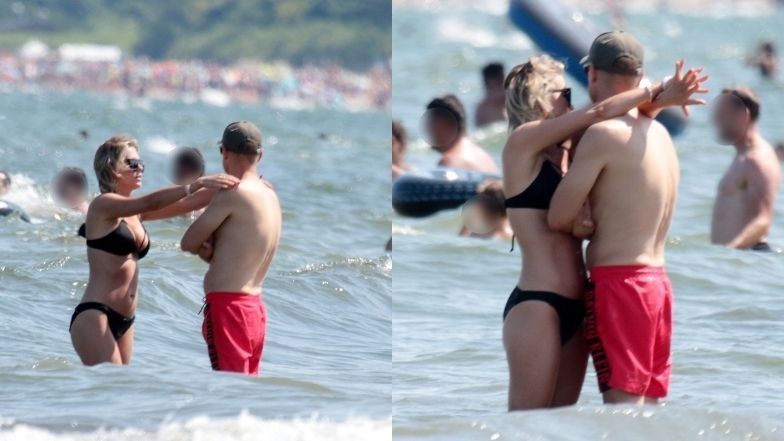 Marcin Mroczek wymienia czułości z żoną na sopockiej plaży