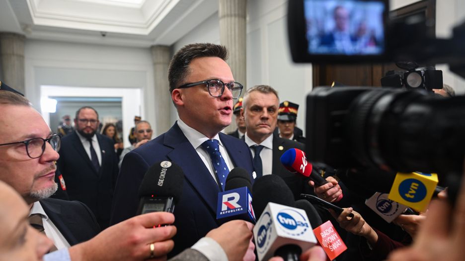 WARSAW, POLAND - DECEMBER 12: Speaker of the Parliament, Szymon Holownia talks to the press after Grzegorz Braun, member of far-right political alliance Confederation used a fire extinguisher to put out the Hanukkah menorah candles at the Parliament (SEJM) on December 12, 2023 in Warsaw, Poland. on December 12, 2023 in Warsaw, Poland. After eight years of Poland's national conservative party in power, centrist Donald Tusk is back and set to forge a pro-EU government. (Photo by Omar Marques/Getty Images)