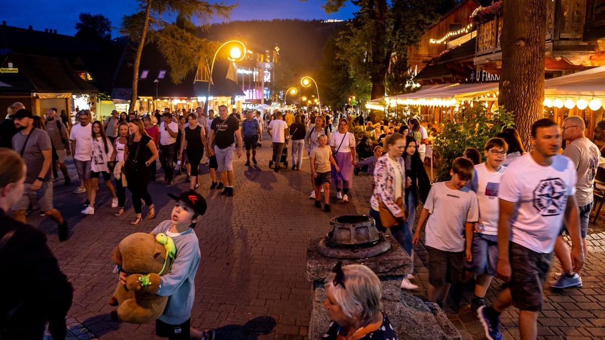 Crowds of tourist walks on landmark Krupowki Street in Zakopane, Poland on August 8, 2025. Zakopane is a gate-town to Tatra National Park, the 2024 world's most visited National Park. (Photo by Dominika Zarzycka/NurPhoto via Getty Images)