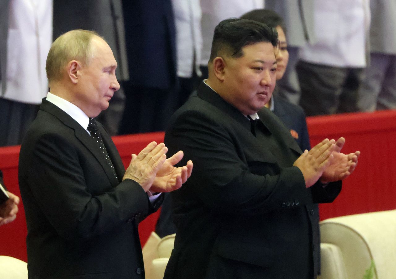 Vladimir Putin and Kim Jong Un