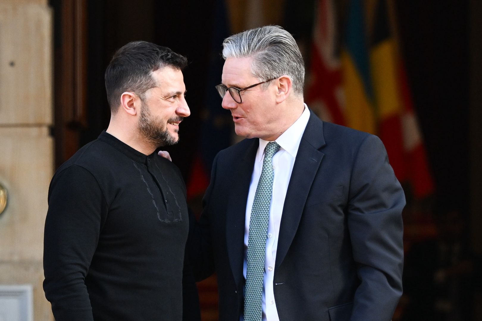 Volodymyr Zelenskiy, Ukraine's president, left, and Keir Starmer, UK prime minister, ahead of a summit in London, UK, on Sunday, March 2, 2025. UK Prime Minister Keir Starmer is hosting Ukrainian President Volodymyr Zelenskiy and more than a dozen other European leaders to discuss security guarantees the continent can offer Kyiv in the event of a ceasefire with Russia. Photographer: Chris J. Ratcliffe/Bloomberg via Getty Images