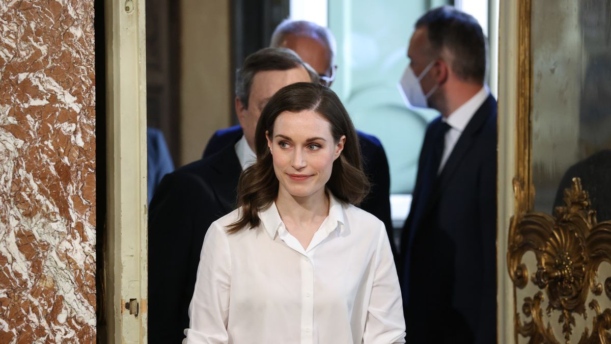 Mario Draghi, Italy's prime minister, left, and Sanna Marin, Finland's prime minister, center, arrive at a news conference following their meeting at the Chigi Palace in Rome, Italy, on Wednesday, May 18, 2022. NATO received formal membership bids from Finland and Sweden as Russias war in Ukraine reshapes European defense, but the Nordic nations must first overcome opposition from Turkey. Photographer: Alessia Pierdomenico/Bloomberg via Getty Images