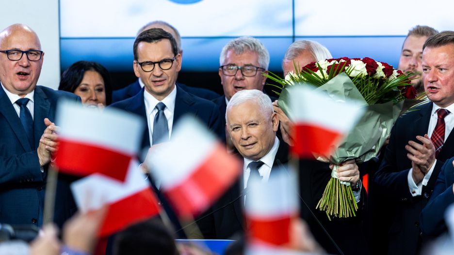 Jaroslaw Kaczynski (C ) leader of the ruling national-conservative Law and Justice (PiS) party, Prime Minister Mateusz Morawiecki (2 L)  during a speech to supporters after announcing the preliminary results of Poland's parliamentary elections, in Warsaw, October 15, 2023, Poland

 (Photo by Andrzej Iwanczuk/NurPhoto via Getty Images)