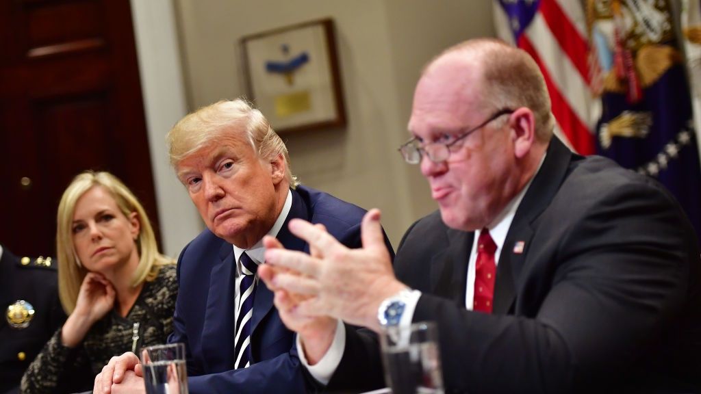 President Trump holds a law enforcement roundtable on sanctuary cities at the White House
WASHINGTON, DC - MARCH 20:  President Donald Trump (C) holds a law enforcement roundtable on sanctuary cities, in the Roosevelt Room at the White House on March 20, 2018 in Washington, D.C. Trump was joined by Homeland Security Secretary Kirstjen Nielsen (L) and Thomas Homan, acting director of Immigration and Customs Enforcement. (Photo by Kevin Dietsch-Pool/Getty Images)
Pool