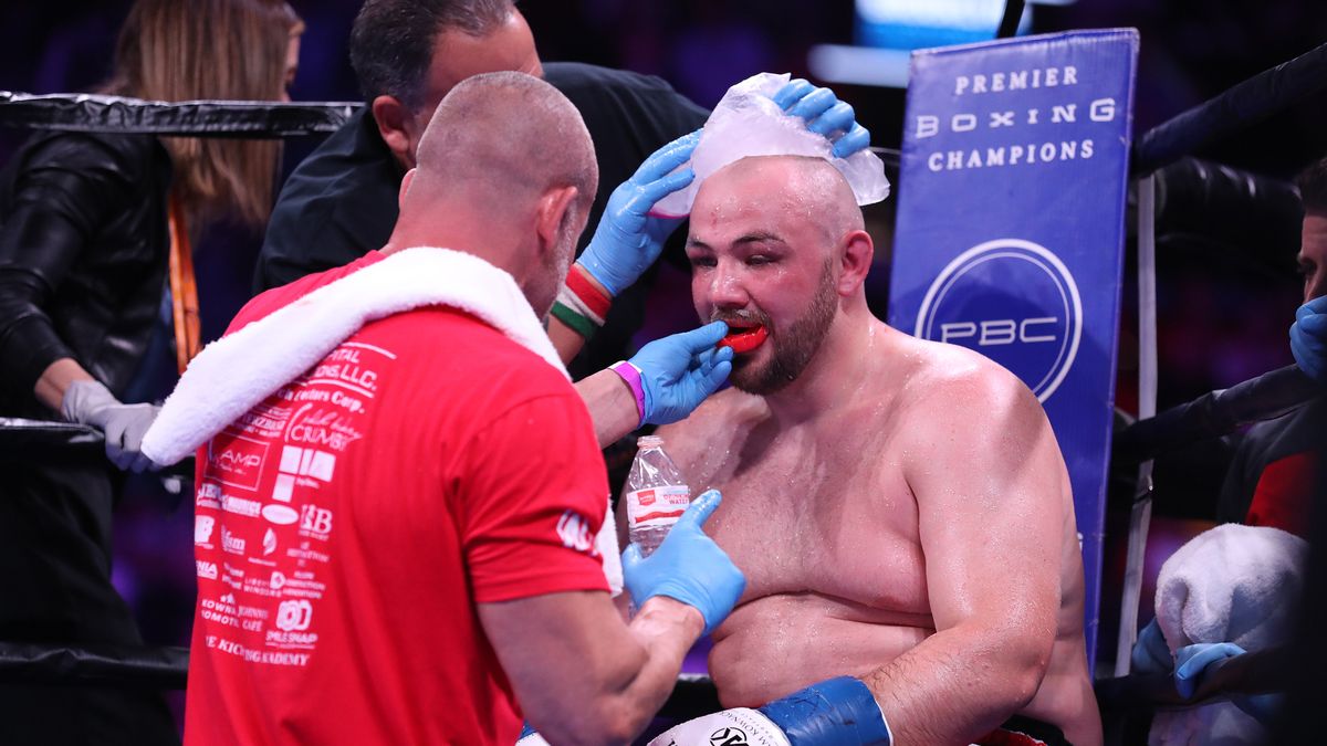 NEW YORK, NEW YORK - AUGUST 03:  Adam Kownacki is tended to in his corner between rounds against Chris Arreola during their heavyweight fight at Barclays Center on August 03, 2019 in New York City. (Photo by Al Bello/Getty Images)