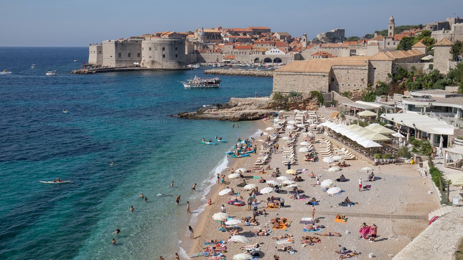 People enjoying the beach at Banje beach at the end of summer season in Dubrovnik, Croatia on September 13, 2023. (Photo: Grgo Jelavic/PIXSELL/DeFodi Images News via Getty Images)