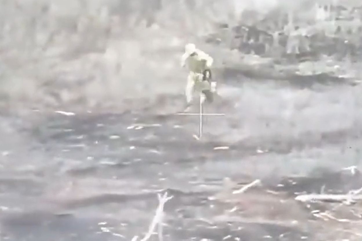 A Russian soldier escaped from a vehicle that blew up on a mine moments later.