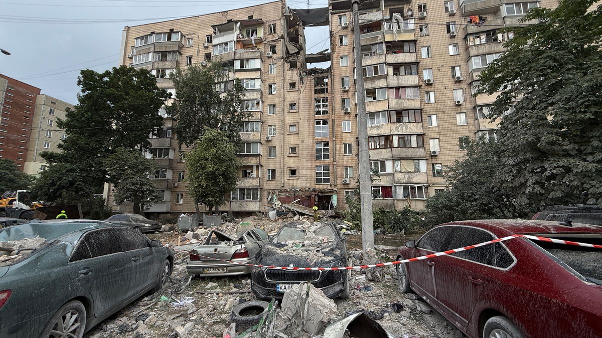 Damaged cars stand beside a crater in front of a nine-storey residential building damaged in a massive combined Russian attack in Kyiv's Podilskyi district, Ukraine, on July 6, 2026. Russian forces launched a large-scale attack on the capital using ballistic and cruise missiles as well as attack drones, causing destruction to apartment buildings and civilian infrastructure across several districts of the city. The Podilskyi district suffered the most severe damage. At least 11 people were killed and 46 others were injured (Photo by Kyrylo Chubotin/Ukrinform) (Photo credit should read Kyrylo Chubotin/ Ukrinform/Future Publishing via Getty Images)