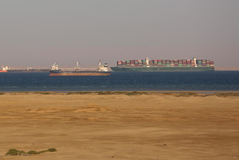 Commercial cargo and container ships ride anchor while waiting to enter the Suez Canal in Suez, Egypt, on Sunday, March 28, 2021. A new attempt could be made Sunday to re-float the 400-meter-long container ship 'Ever Given' blocking the Suez Canal. Photographer: Islam Safwat/Bloomberg via Getty Images