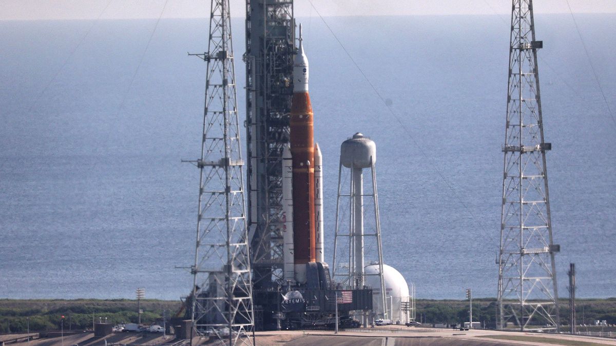 After rolling out overnight, a view of Artemis I at launch pad 39-B at Kennedy Space Center, Florida, as seen from the roof the VAB, Wednesday, Aug. 17, 2022. The rocket is scheduled to launch on an unmanned mission to orbit the moon on Aug. 29. (Joe Burbank/Orlando Sentinel/Tribune News Service via Getty Images)