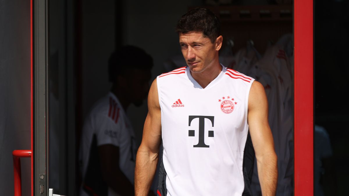 MUNICH, GERMANY - JULY 15:  Robert Lewandowski of FC Bayern München walks onto the training pitch before a training session of FC Bayern München at Saebener Strasse training ground on July 15, 2022 in Munich, Germany. (Photo by A. Pretty/Getty Images for FC Bayern)