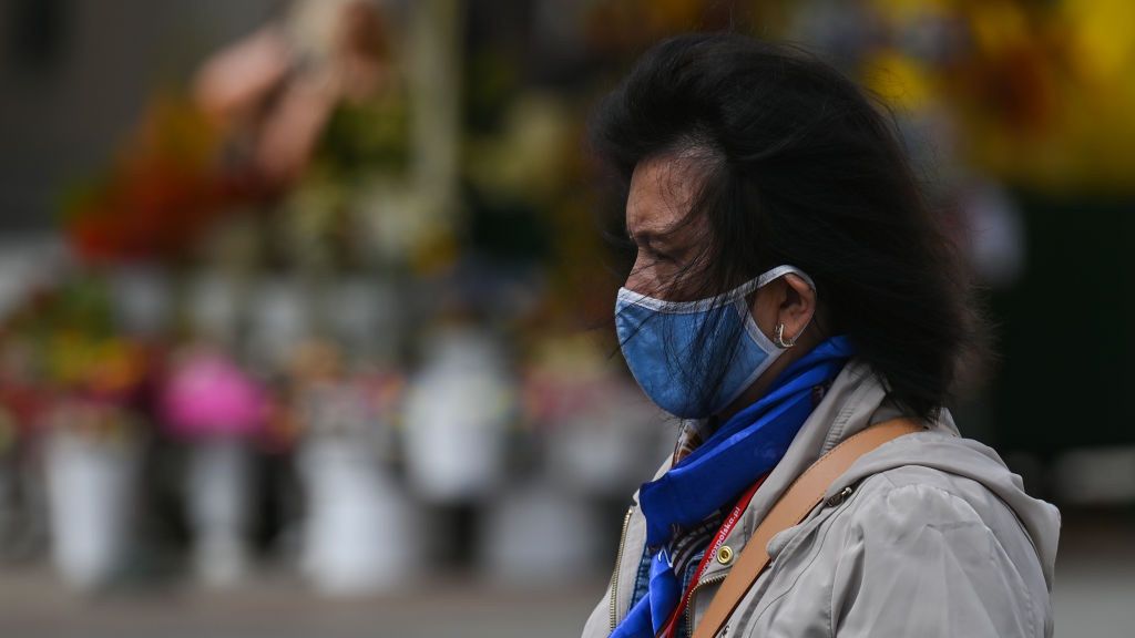 Daily Life In Krakow
A woman wearing a medical face mask seen in Krakow's Old Town.
On Tuesday, July 12, 2022, in Krakow, Poland. (Photo by Artur Widak/NurPhoto via Getty Images)
NurPhoto
business and finance, covid vigilance, covid-19 variant, humain interest, lifestyle, tourists, visitors, wave, booster, crowd, daily life, infections, inflation, inhections, new cases, medical face mask, woman, photo