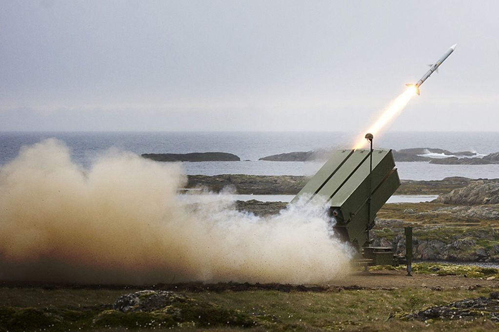 Launching an AIM-120 AMRAAM missile from the NASAMS launcher.