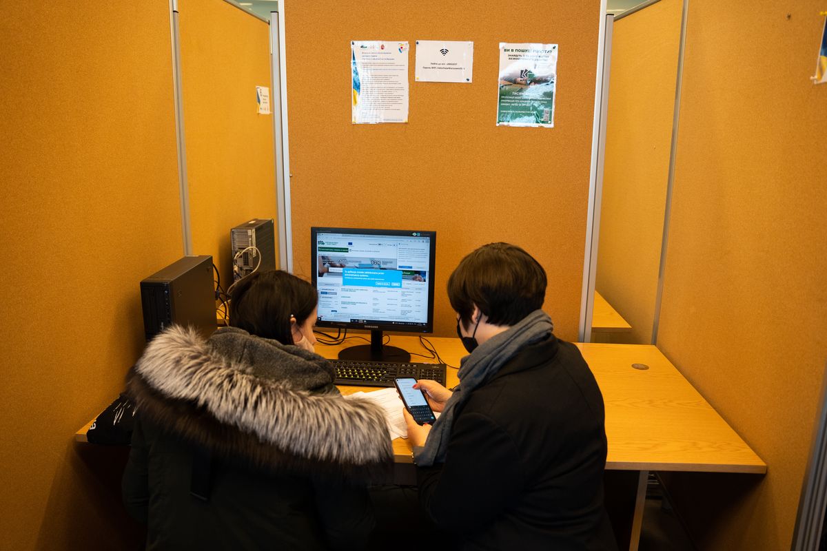 Refugees from Ukraine look for jobs at a Polish government organisation in Warsaw, Poland, on March 21, 2022. (Photo by Annabelle Chih/NurPhoto via Getty Images)