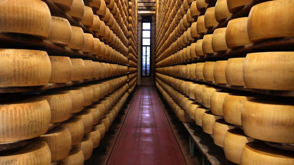 Parmigiano-Reggiano Production
SANTA CROCE, ITALY - MARCH 26: Wheels of Parmigiano-Reggiano (Parmesan) cheese, all made in the traditional method, age for at least one year but also as long as three years on wooden shelves at Caseificio Censi, the Censi family dairy, on March 26, 2017 in Santa Croce, a farming village near Parma, Italy. Italian Parmesan cheese is only made in "Protected Designation of Origin" areas and according to the regulations of the consortium, the Consorzio Parmigiano-Reggiano. (Photo by David Silverman/Getty Images)
David Silverman