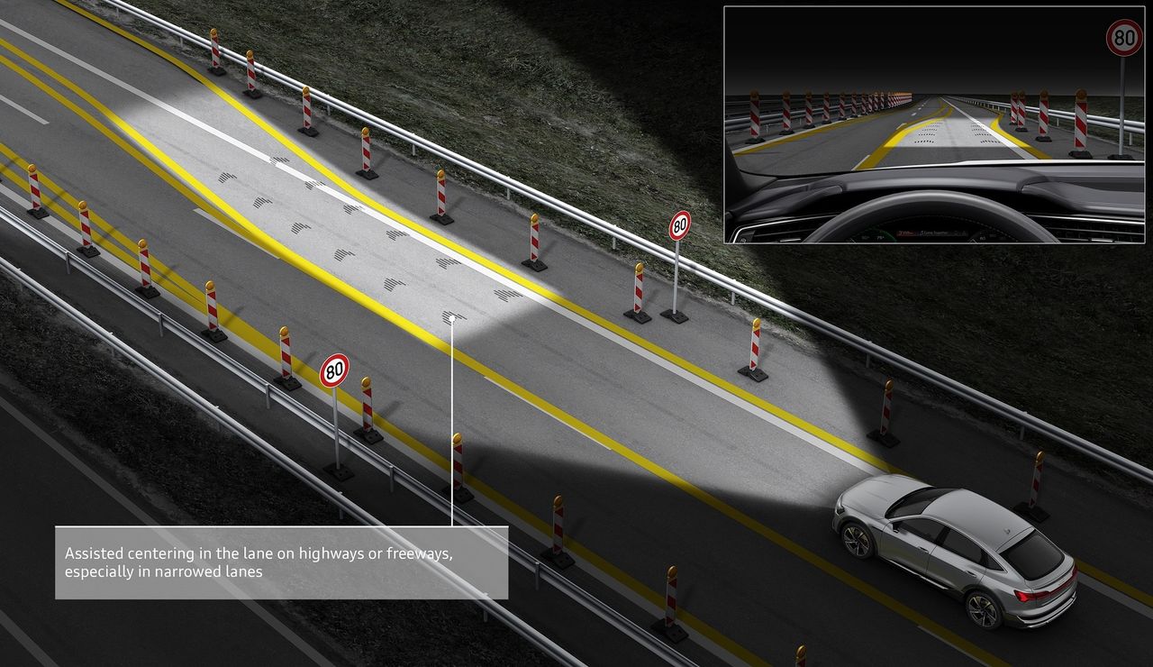 Funkcja "świetlnego dywanu" zaprezentowana podczas działania świateł drogowych w Audi e-tron