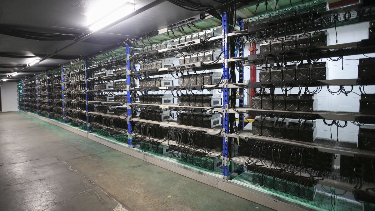 Cryptocurrency mining machines at a Canada Computational Unlimited Inc. computation center in Joliette, Quebec, Canada, on Friday, Sept. 10, 2021. CCU.ai, a Bitcoin mining center powered by hydroelectricity, has been conditionally approved for trading on the TSX Venture Exchange in Toronto under the stock symbol SATO. Photographer: Christinne Muschi/Bloomberg via Getty Images