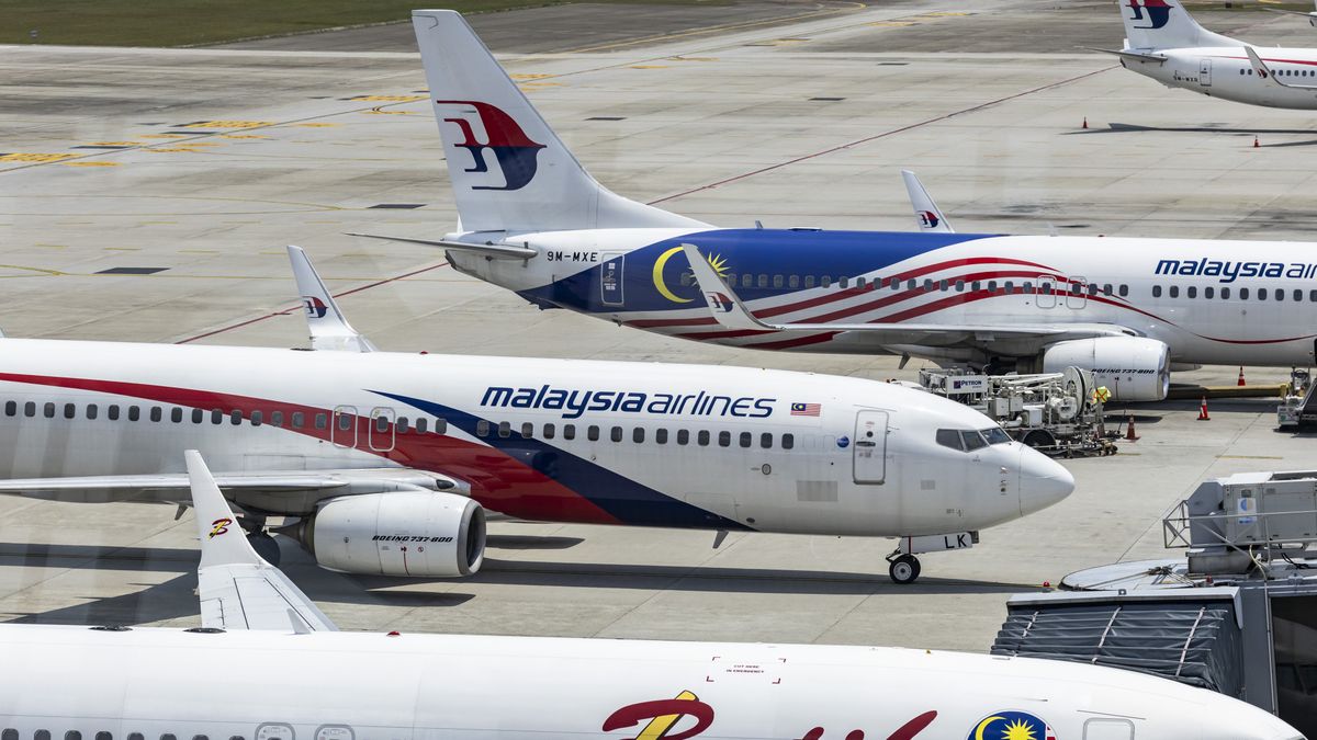 Aircraft on the tarmac at the Kuala Lumpur International Airport (KLIA) in Sepang, Selangor, Malaysia, on Wednesday, April 3, 2024. After posting its first net profit in more than 10 years, Chief Executive Officer Izham Ismail wants to write a new chapter  shedding the carrier's troubled past and transforming it into a well-run, consistently profitable airline. Photographer: Richard Humphries/Bloomberg via Getty Images