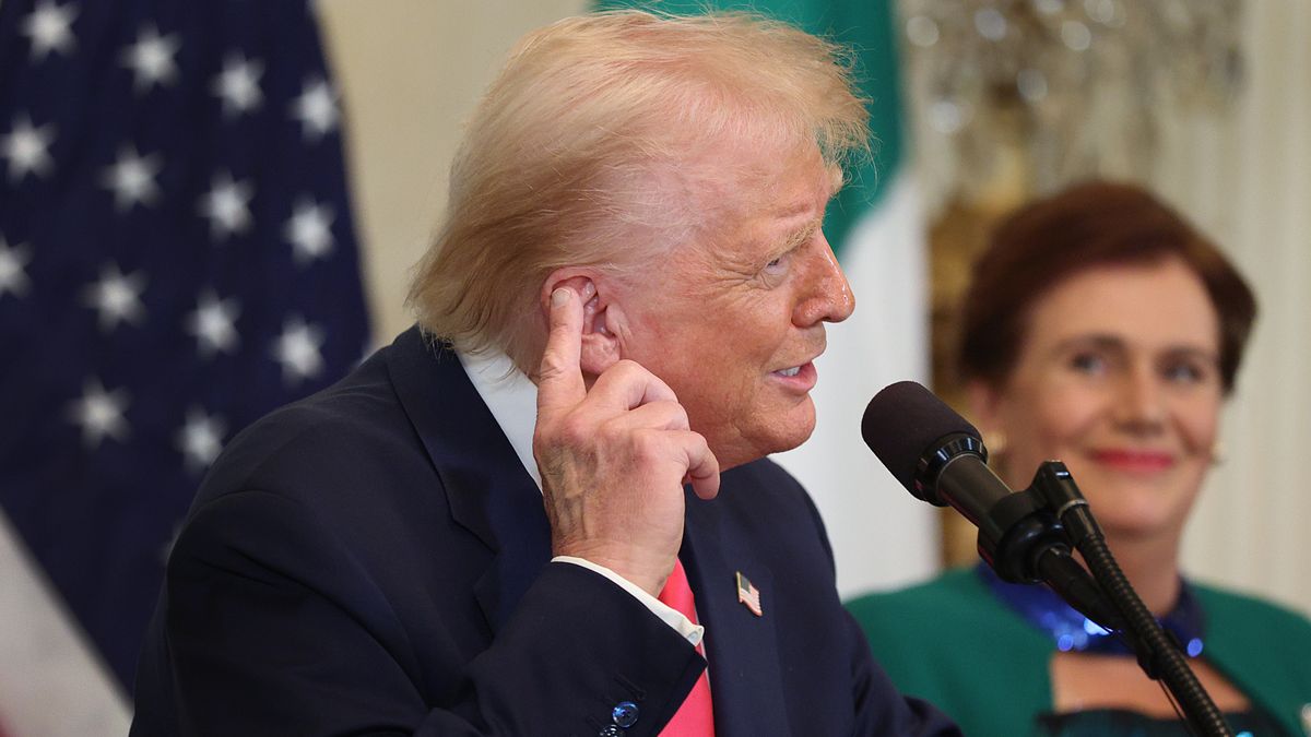 WASHINGTON, DC - MARCH 12: U.S President Donald Trump meets with Irish Taoiseach Micheál Martin and his wife Mary O'Shea during a St. Patrick’s Day event in the East Room of the White House on March 12, 2025 in Washington, DC. Martin traveled to the United States for the Irish leader's annual St. Patrick's Day visit where he attended a luncheon with Congressional leaders and a meeting in the Oval Office with Trump.  (Photo by Kayla Bartkowski/Getty Images)