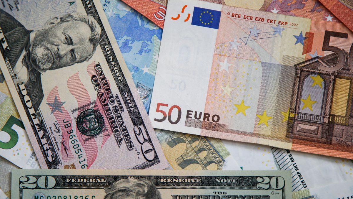 UNITED KINGDOM - 2022/03/07: This photo illustration displays a collection of fifty and twenty dollar bills with fifty Euro banknotes. The British pound hit its lowest against the dollar since December 2020 as Russia's invasion of Ukraine continues. The Bank of England (BoE) is expected to increase the interest rates for a third consecutive time later this month. (Photo Illustration by Dinendra Haria/SOPA Images/LightRocket via Getty Images)