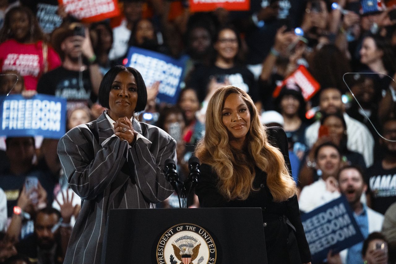 HOUSTON, TEXAS - OCTOBER 25: Singers Kelly Rowland and Beyoncé speak at a campaign rally for Democratic presidential nominee, Vice President Kamala Harris, on October 25, 2024 in Houston, Texas. Harris is campaigning in Texas holding a rally supporting reproductive rights with recording artists Beyoncé and Willie Nelson.  (Photo by Jordan Vonderhaar/Getty Images)