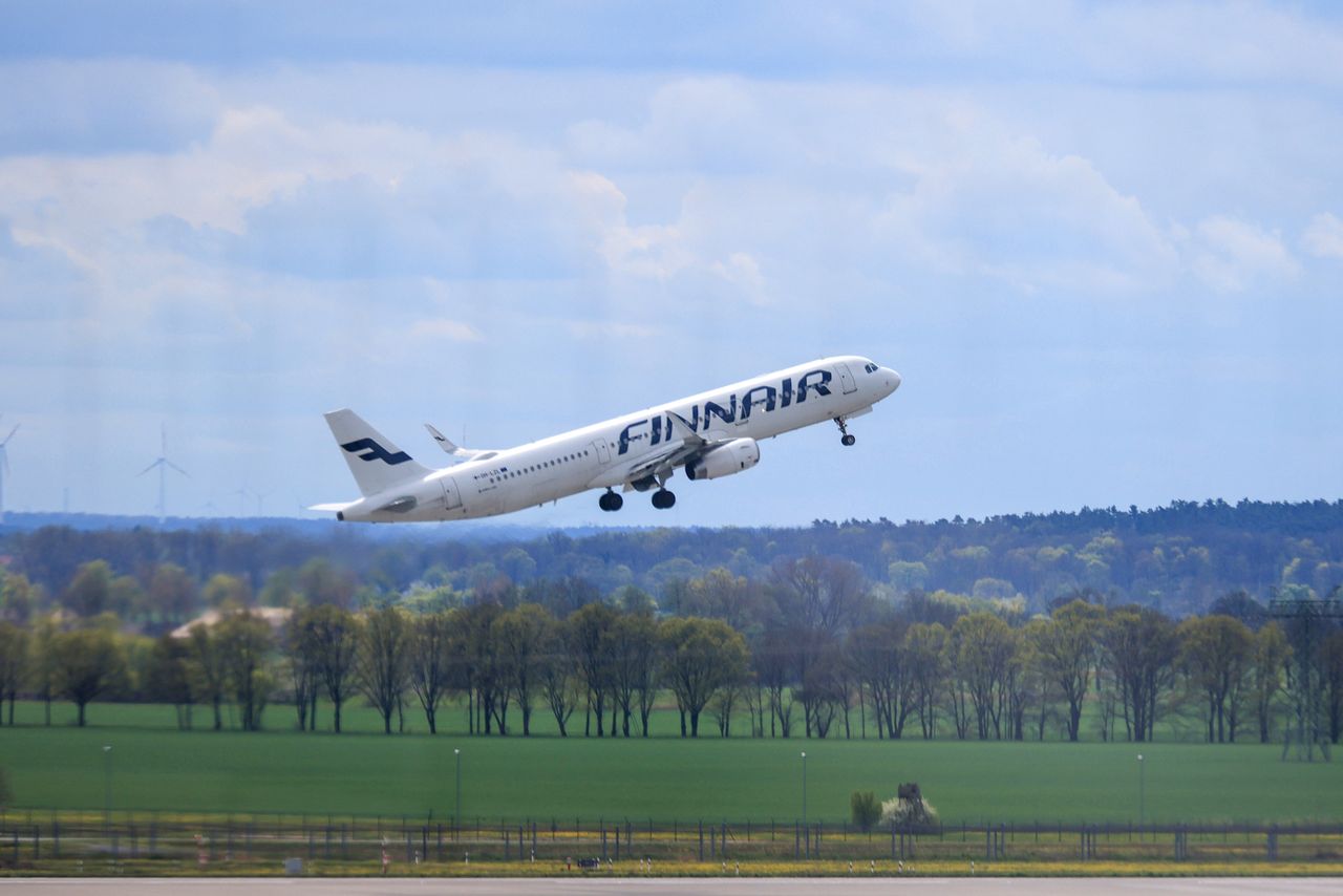 A passenger aircraft, operated by Finnair Oyj, takes off, during a one-day strike by security control staff, at Berlin Brandenburg airport in Berlin, Germany, on Monday, April 24, 2023. Berlin's main airport canceled all departing flights today amid another round of strikes by ground crew, underscoring ongoing labor tensions in Germany's travel sector as the crucial summer travel season looms into view. Photographer: Krisztian Bocsi/Bloomberg via Getty Images